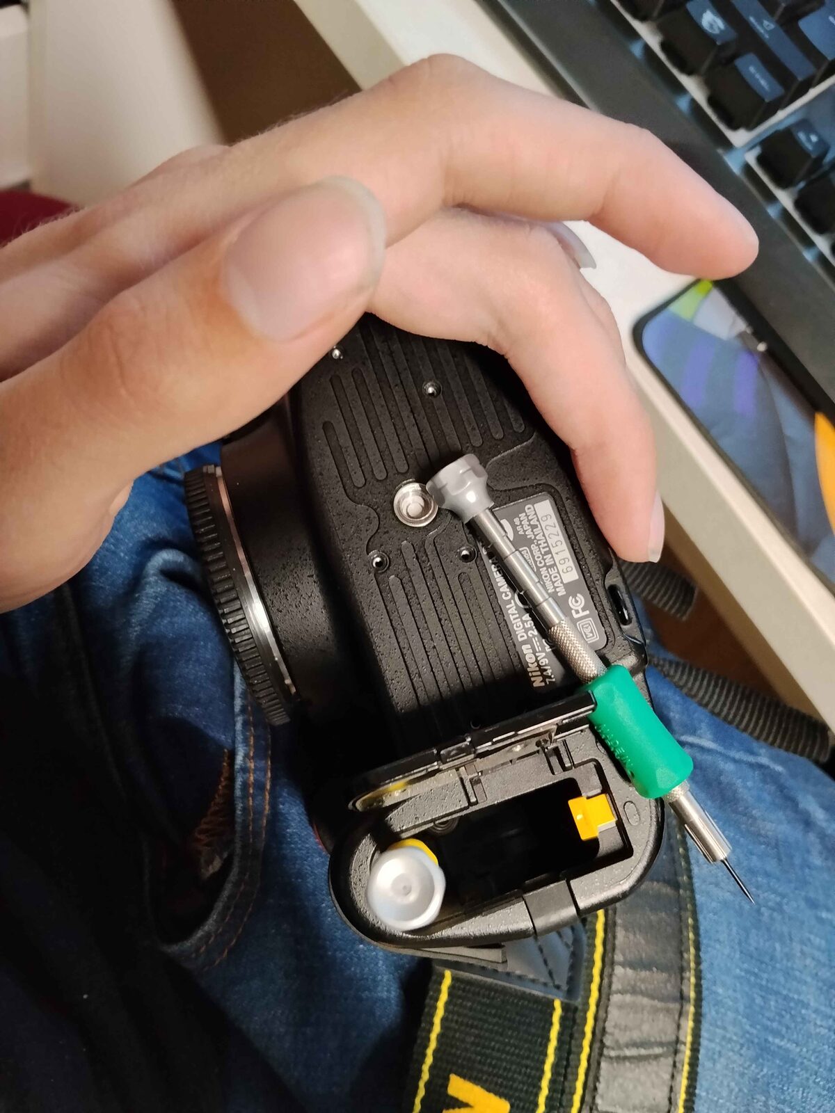 The recessed battery compartment screw swallowing the screw driver